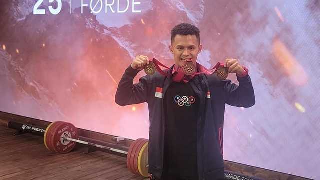 Rizki Juniansyah Raih 2 Emas, Pecahkan Rekor Dunia Angkat Besi