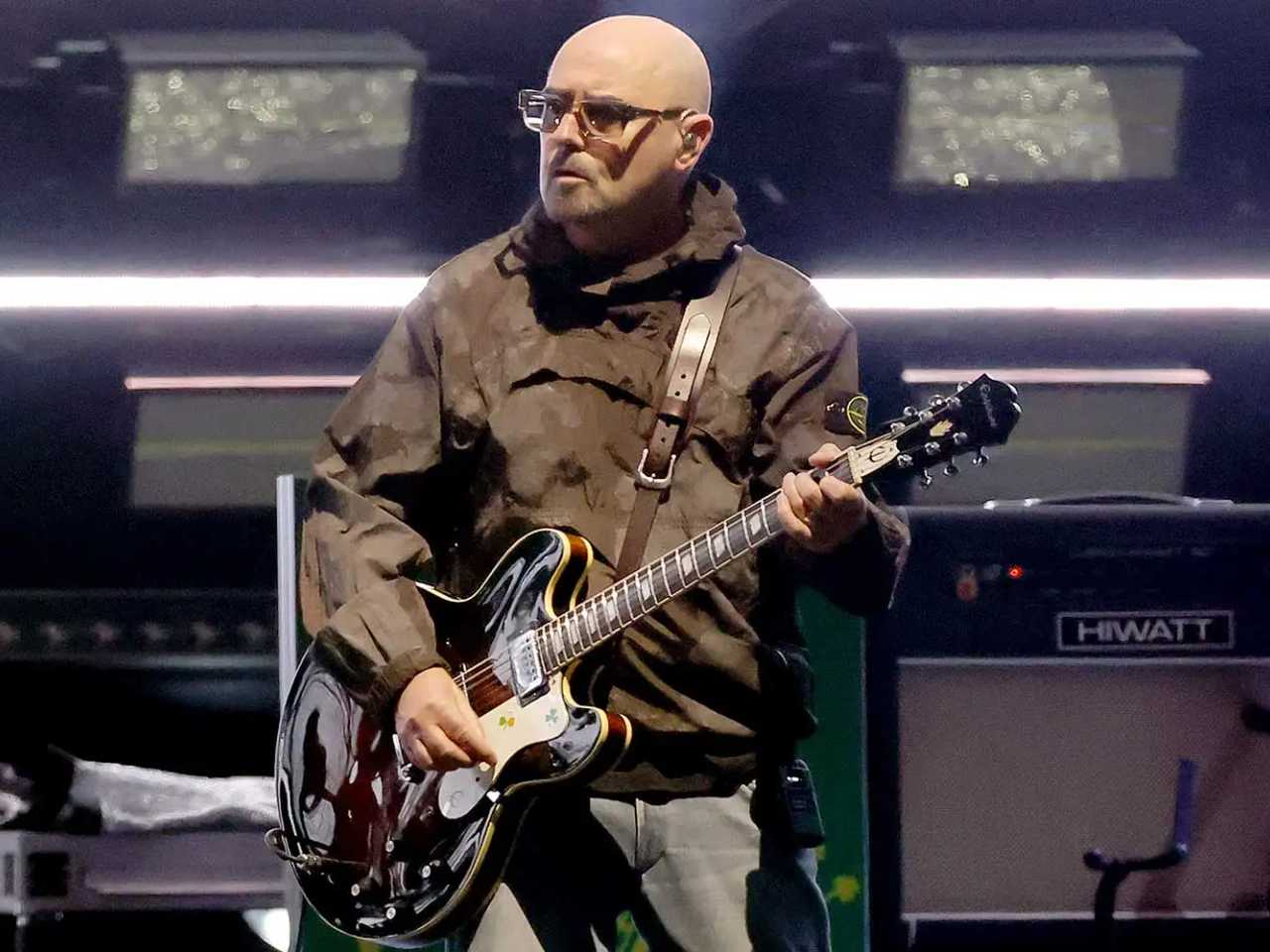 Gitaris Oasis Paul 'Bonehead' Arthurs Absen Tur Reuni, Fokus Lawan Kanker Prostat